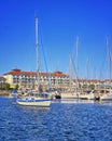 Holiday houses with sailboats in the harbor Weisse Wiek